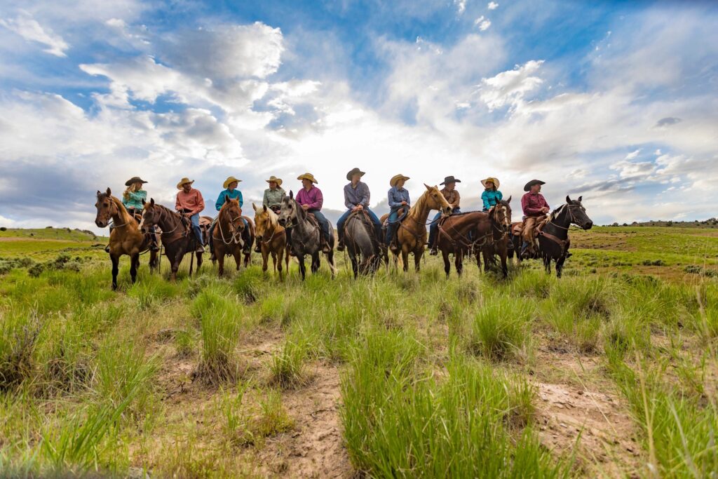 guided horseback riding group outdoors